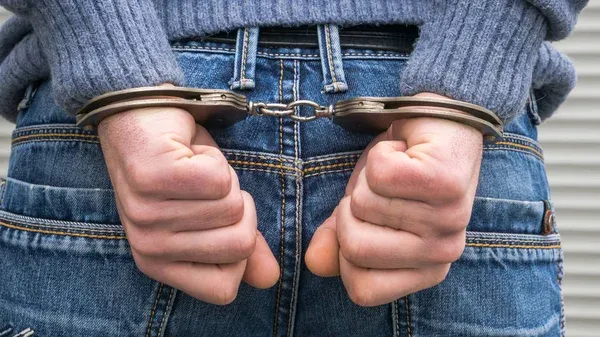 depositphotos_242616780-stock-photo-handcuffed-thief-arrest-gangster-terorist